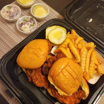 Dave's Hot Chicken - Med & Hot crispy chicken sandwiches and fries, w/pickles and slaw on the side - Chicken Shop Near Me - Folsom, California