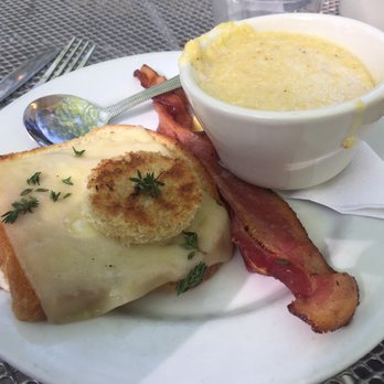 Big City Bread Cafe - Birds nest with bacon and grits outside on the patio! - Bakeries Near Me - Athens, Georgia