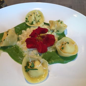 Gather in Jackson Hole - Corn and Buratta tortellini: English pea and mint purée, creamed corn, chives pecorino, truffle honey nasturtium. - New American Near Me - Jackson, Wyoming Gather in Jackson Hole - Corn and Buratta tortellini: English pea and mint purée, creamed corn, chives pecorino, truffle honey nasturtium. - New American Near Me - Jackson, Wyoming
