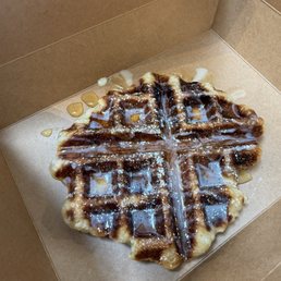 Human croissant waffle with syrup and condensed milk . It was good! Human croissant waffle with syrup and condensed milk . It was good!