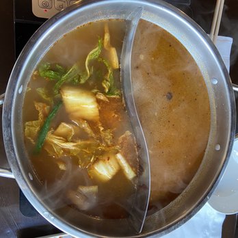 Zu Hot Pot - On the left is the Korean kimchi, on the right is the taiwanese flavor - Hot Pot Near Me - Albuquerque, New Mexico