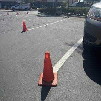 Farmer Boys - the worker moved it slightly as they were asking me, so it was even more on the other side of the line. - Burgers Near Me - Escondido, California