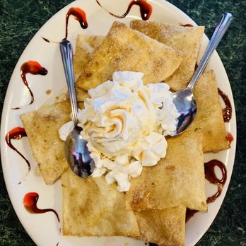 El Potro - a plate of pancakes with whipped cream and syrup - Mexican Near Me - Winter Park, Florida El Potro - a plate of pancakes with whipped cream and syrup - Mexican Near Me - Winter Park, Florida