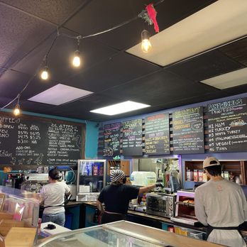 Birdcage Comics Cafe - Overhead wall menu - Cafes Near Me - San Bernardino, California Birdcage Comics Cafe - Overhead wall menu - Cafes Near Me - San Bernardino, California