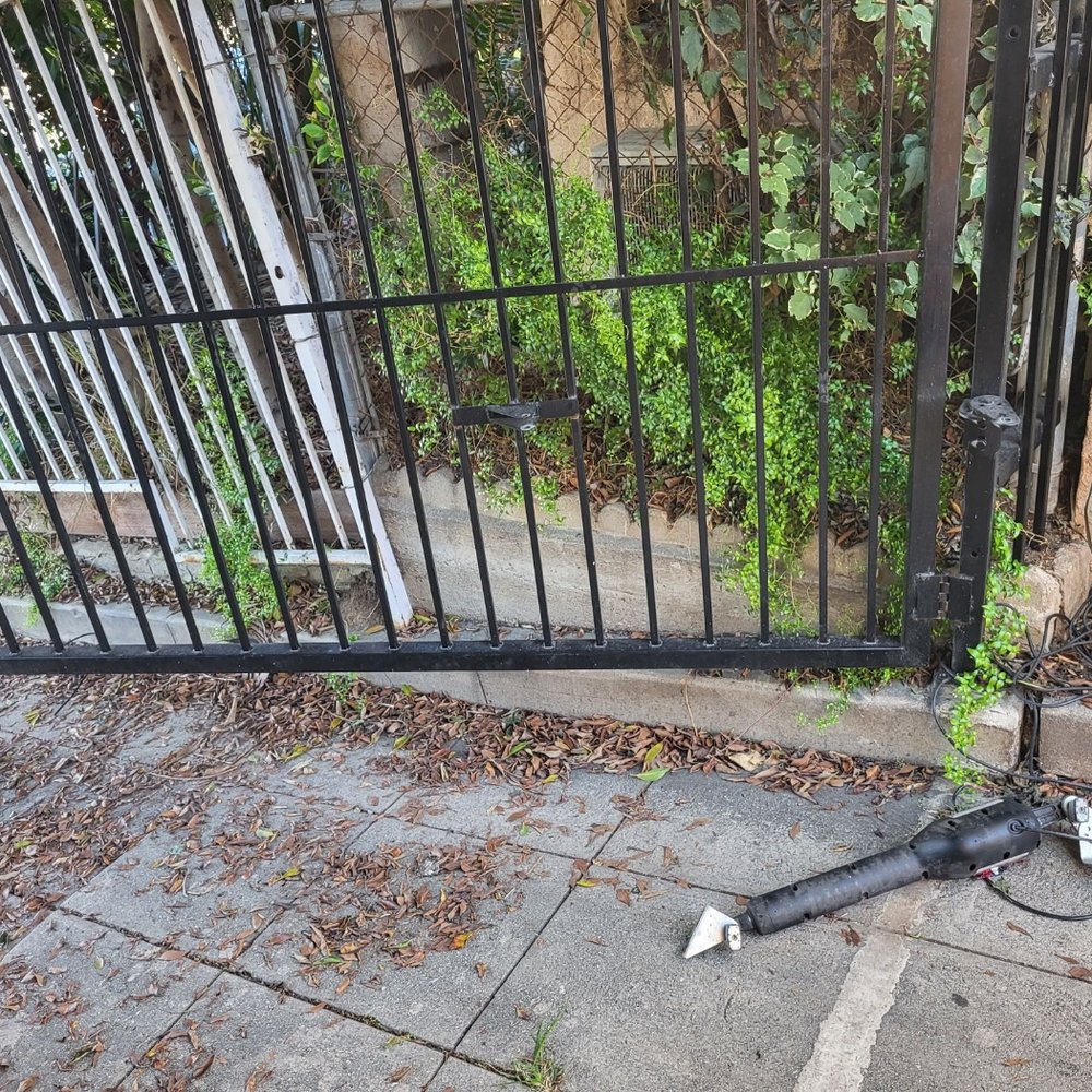 Gates Express - Before, gate opener refusing to respond, had to be taken down by the technician - Garage Door Services Near Me - Los Angeles, California Gates Express - Before, gate opener refusing to respond, had to be taken down by the technician - Garage Door Services Near Me - Los Angeles, California