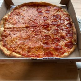 Full size pie with half pepperoni Full size pie with half pepperoni