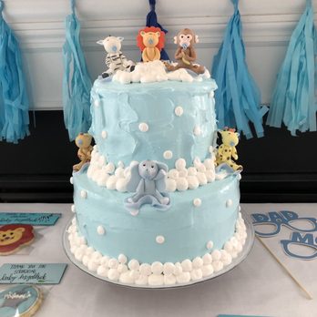 Antojitos Dominicanos - a blue cake decorated with animals - Bakeries Near Me - Lilburn, Georgia