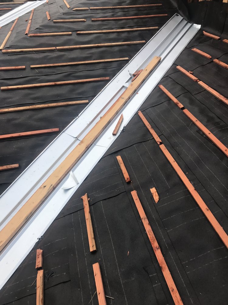 Slide of Alvaro's Roofing