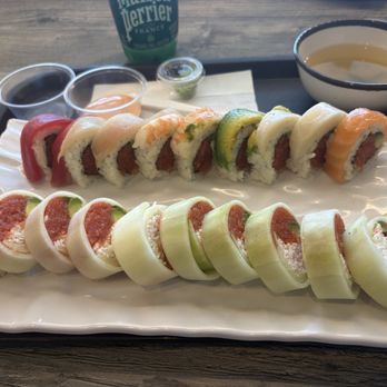 Sushi N Go - These rolls are huge!!! Fresh and spicy rainbow roll! - Sushi Bars Near Me - Norwalk, California