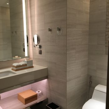 Clark Marriott Hotel - Beautifully appointed bath.  And for those interested, the spray to the left of toilet is a bidet. - Hotels Near Me - Mabalacat, PAM