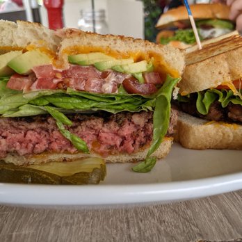 Z Cafe - FALLBROOK MELT | 8.95 ​ Angus patty, cheddar, avocado, tomato, lettuce, and thousand island on grilled sourdough bread - Breakfast & Brunch Near Me - Bonsall, California