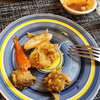 Thai & Vine - Calamari. Peanut sauce was Yummy! - Thai Near Me - Oak Island, North Carolina Thai & Vine - Calamari. Peanut sauce was Yummy! - Thai Near Me - Oak Island, North Carolina