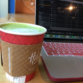 Allegro Coffee - a cup of coffee next to a laptop - Coffee & Tea Near Me - Los Angeles, California
