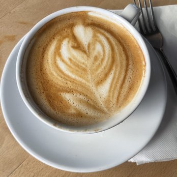 Ollie Vaughn's - Oat milk latte with beautiful latte art - Sandwiches Near Me - Phoenix, Arizona
