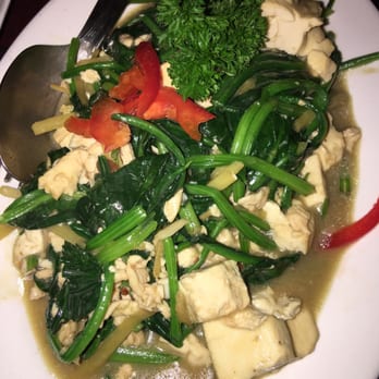 Battambang - #93 w/ chicken Spinach cubed tofu and shredded ginger sautéed with a brown garlic sauce - Cambodian Near Me - Oakland, California Battambang - #93 w/ chicken Spinach cubed tofu and shredded ginger sautéed with a brown garlic sauce - Cambodian Near Me - Oakland, California