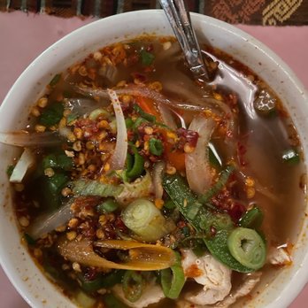 Bangkok Restaurant - Tom Yum with a blanket of chili pepper powder. - Thai Near Me - Sarasota, Florida