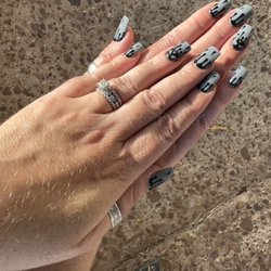 Nails with custom Halloween design.