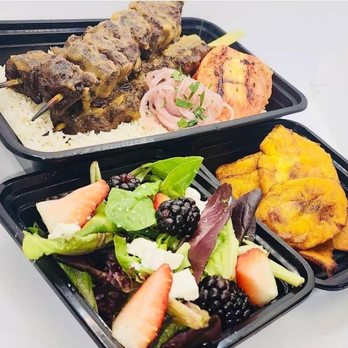 Pangaea - two trays of food with meat and vegetables - Mediterranean Near Me - Las Vegas, Nevada Pangaea - two trays of food with meat and vegetables - Mediterranean Near Me - Las Vegas, Nevada