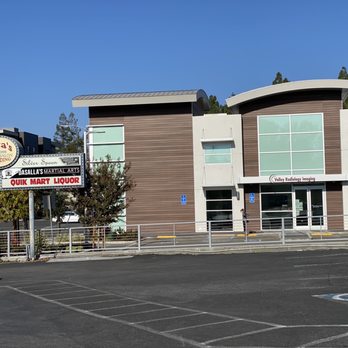 Super Quick Mart - a parking lot with cars parked in front of it - Convenience Stores Near Me - Sunnyvale, California Super Quick Mart - a parking lot with cars parked in front of it - Convenience Stores Near Me - Sunnyvale, California