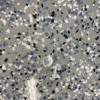 The Epoxy Garage Guy - Here's one of MANY bubbles throughout the garage floor - Flooring Near Me