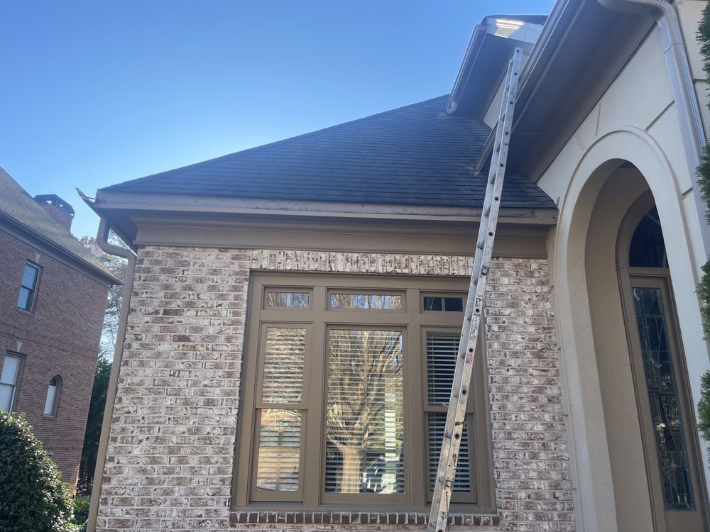 Slide of Arc Gutter Cleaning