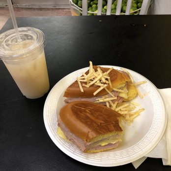 El Palacio De Los Jugos - Media Noche sandwich to go along with a Soursop juice (Guanabana) - Cuban Near Me - Miami, Florida El Palacio De Los Jugos - Media Noche sandwich to go along with a Soursop juice (Guanabana) - Cuban Near Me - Miami, Florida