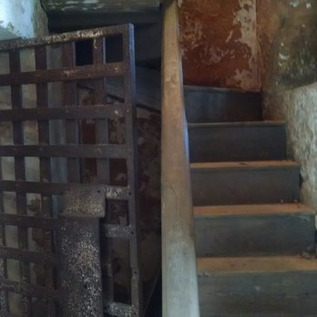 Old Greene County Gaol - A cell to the left and steps to the hanging platform. - Landmarks & Historical Buildings Near Me - Greensboro, Georgia