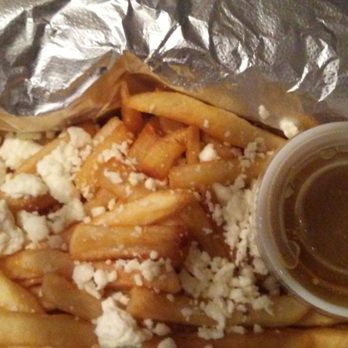George's Gyros - That's a gyro in the foil, didn't want to open til better 2/3ds got got home. They poked holes in the box to save the fries from sogginess. - Salad Near Me - Mesa, Arizona