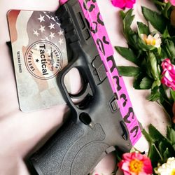 Southern Tactical - Cearkoted leopard print M&P shield slide.