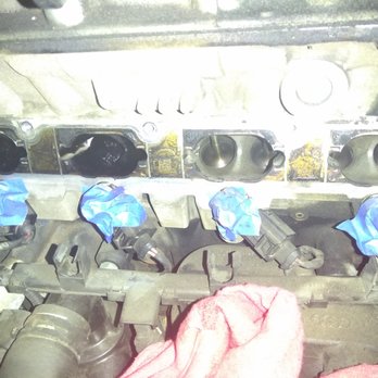 Germantech Automotive - carbon cleaning on VW 2.0 TSI note carbon on valves to left & cleaned valves on the right. - Auto Repair Near Me - Pompano Beach, Florida Germantech Automotive - carbon cleaning on VW 2.0 TSI note carbon on valves to left & cleaned valves on the right. - Auto Repair Near Me - Pompano Beach, Florida
