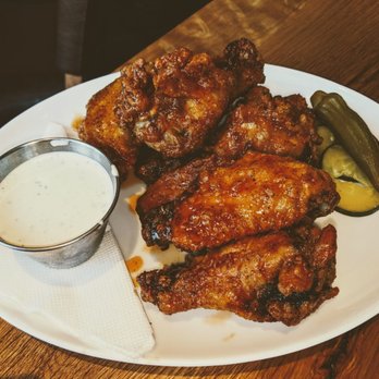 Tupelo Honey Southern Kitchen & Bar - Honey Chipotle Wings with blue cheese dressing and pickled veggies. - Southern Near Me - Denver, Colorado Tupelo Honey Southern Kitchen & Bar - Honey Chipotle Wings with blue cheese dressing and pickled veggies. - Southern Near Me - Denver, Colorado