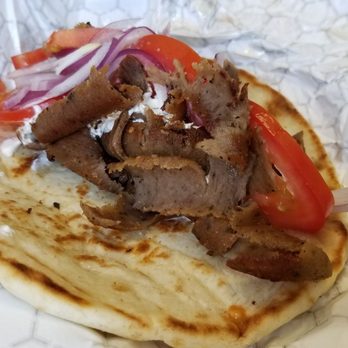 Pappa Gyros - Gyro sandwich $7.99- quite big w/ good amount of protein. Gyro meat is so flavorful and has crispy edges. - Greek Near Me - Katy, Texas Pappa Gyros - Gyro sandwich $7.99- quite big w/ good amount of protein. Gyro meat is so flavorful and has crispy edges. - Greek Near Me - Katy, Texas