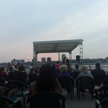 Riverside Park Conservancy - Totally Public Karaoke summer event with sun fading in background - Parks Near Me - New York, New York