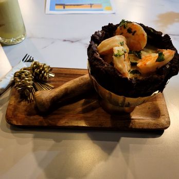 Faros Restaurant - a plate of food on a table - Dominican Near Me - Framingham, Massachusetts