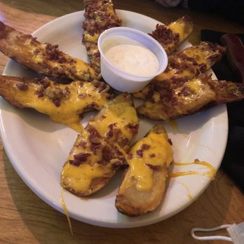 Texas Roadhouse - Loaded potato wedges - Steakhouses Near Me - Pflugerville, Texas Texas Roadhouse - Loaded potato wedges - Steakhouses Near Me - Pflugerville, Texas