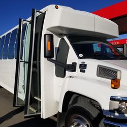 A Limousine Associates - 30 passenger party bus.