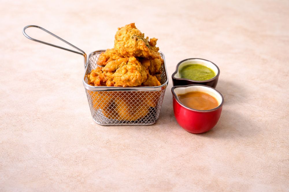 Peppers Indian Cuisine Logo