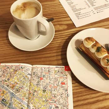 Café Mareva - cafe latte and a lemon merengue pie type pastry - Breakfast & Brunch Near Me - Paris, 75 Café Mareva - cafe latte and a lemon merengue pie type pastry - Breakfast & Brunch Near Me - Paris, 75