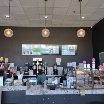 Green Joe Coffee - a counter with a variety of items - Coffee & Tea Near Me - Schaumburg, Illinois