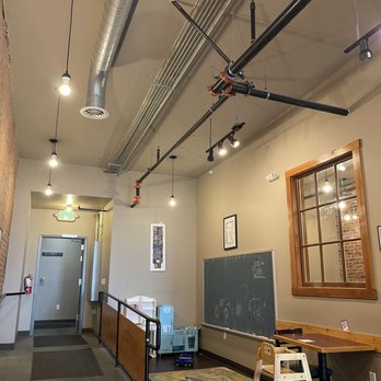 Red Elm Cafe - A cute kids play area located in the back of the restaurant - Cafes Near Me - Tacoma, Washington