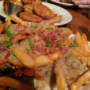 Candlelite Chicago - Poutine. Crispy bacon, cheesecurds, OK gravy, French fries, scallions - Pizza Near Me - Chicago, Illinois