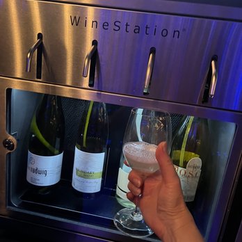 Spring City Wine House - a person holding a glass of wine - Wine Bars Near Me - Waukesha, Wisconsin Spring City Wine House - a person holding a glass of wine - Wine Bars Near Me - Waukesha, Wisconsin