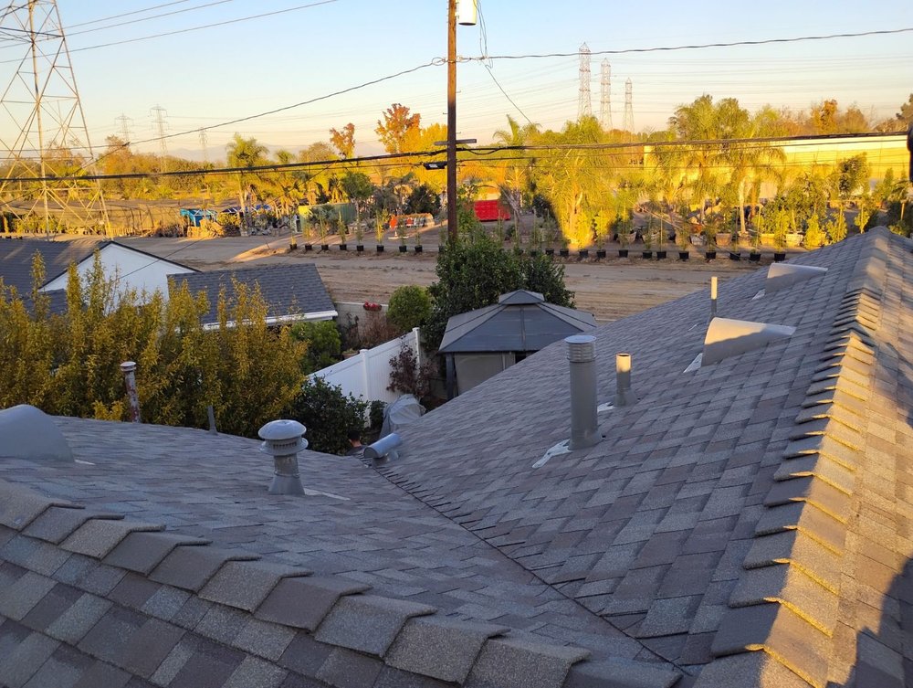 Slide of Sam's Roofing Co