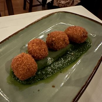 Orto - Risotto balls stuffed with bolognese. Hot, fresh, and delicious. - Italian Near Me - Miller Place, New York
