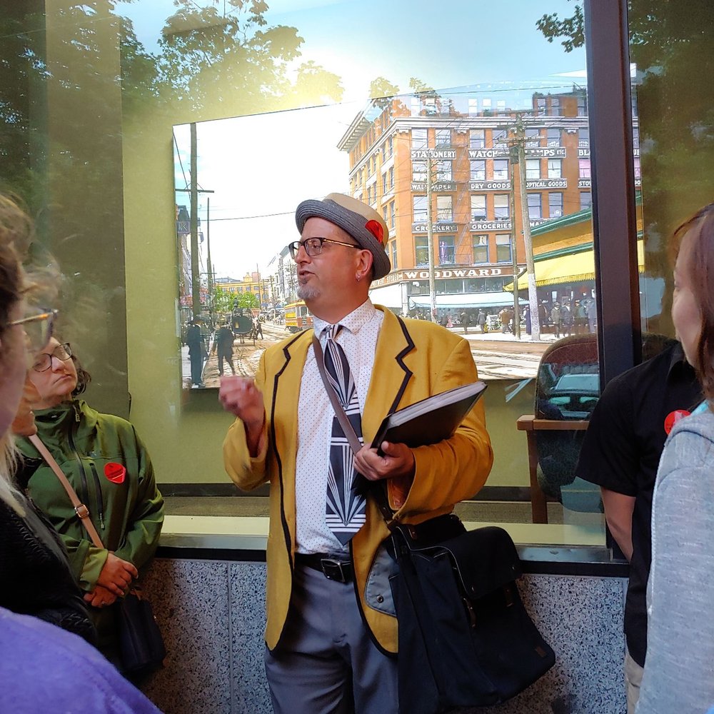 Forbidden Vancouver Walking Tours - Tim in front of a painting of the Woolworth building - Walking Tours Near Me - Vancouver, British Columbia