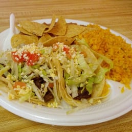 2 beef tacos with rice and beans