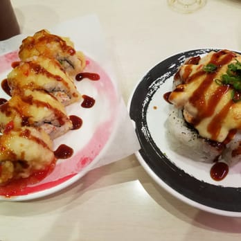 Genki Sushi - Left: Tempura CA roll Right: Scallop dynamite Winnaz! - Sushi Bars Near Me - Honolulu, Hawaii Genki Sushi - Left: Tempura CA roll Right: Scallop dynamite Winnaz! - Sushi Bars Near Me - Honolulu, Hawaii