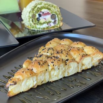 Moka & Co - Bee Bites, Pistachio Napoleon Cake Roll - Coffee & Tea Near Me - Queens, New York Moka & Co - Bee Bites, Pistachio Napoleon Cake Roll - Coffee & Tea Near Me - Queens, New York