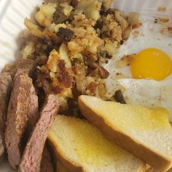 Steak and eggs with hashbrown and toast