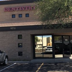 Front of office building.  Look for the "DENTISTRY" in RED letters